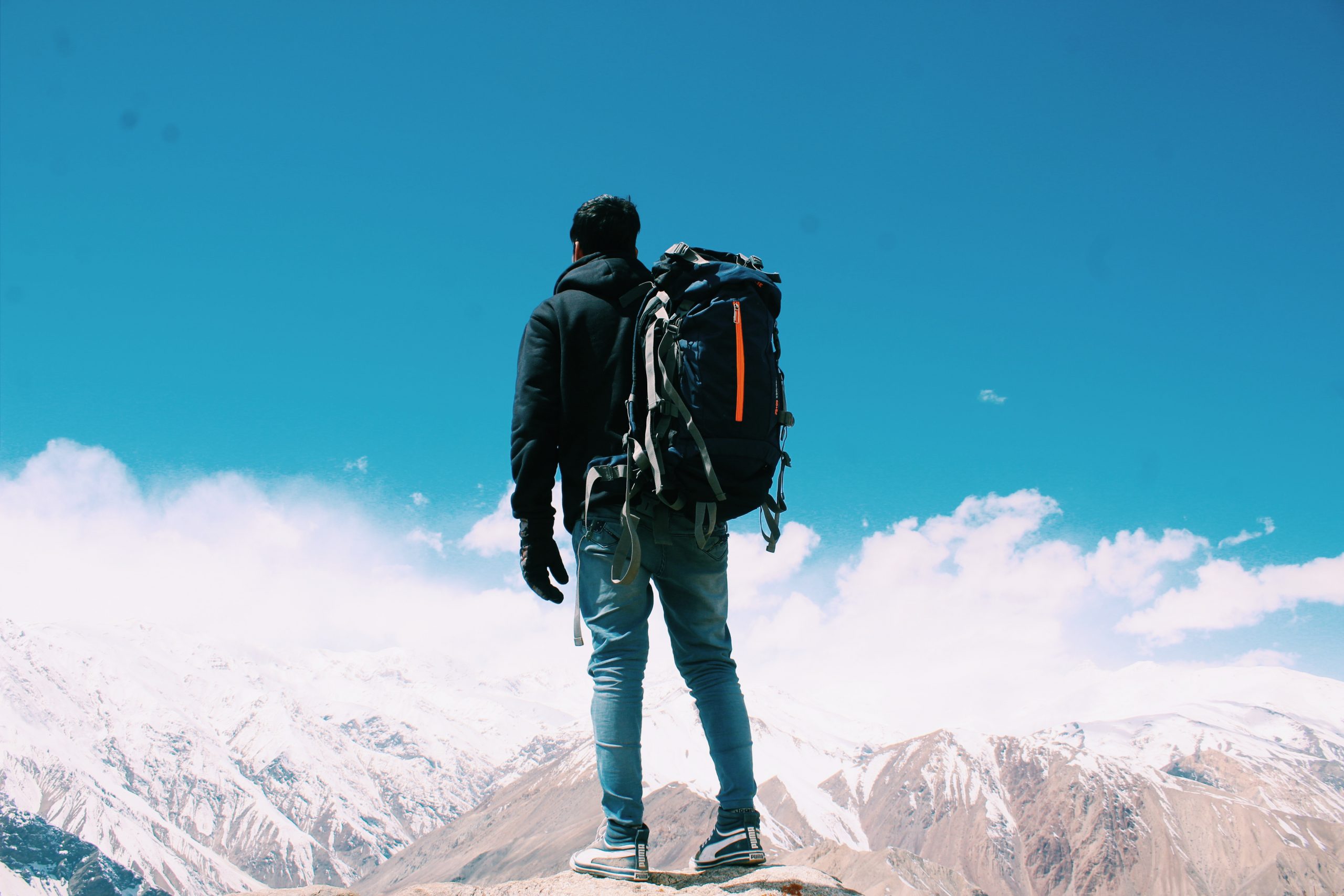 man with bag packed for travel